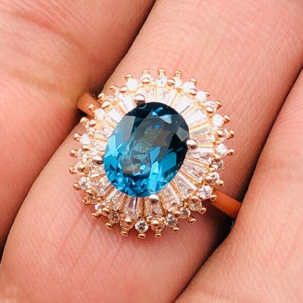 Luxury Blue Topaz Halo Ring - Image 2