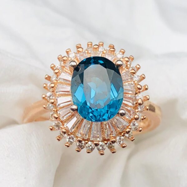 Luxury Blue Topaz Halo Ring - Image 5