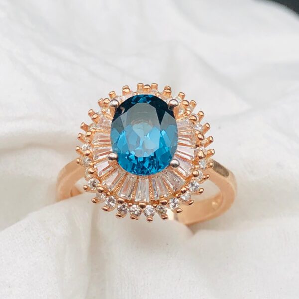 Luxury Blue Topaz Halo Ring - Image 3