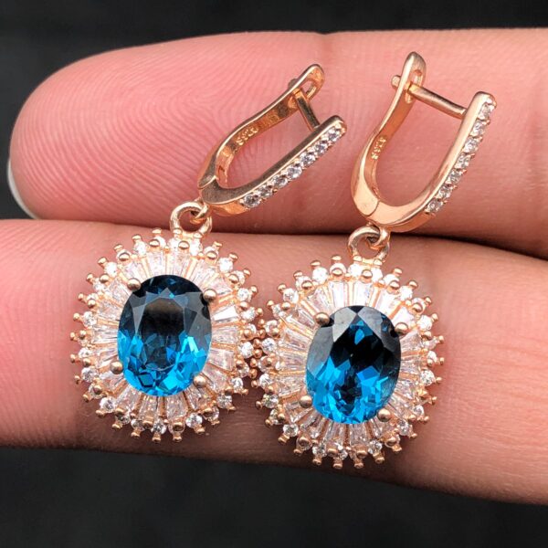 Elegant Blue Topaz Halo Earrings - Image 4