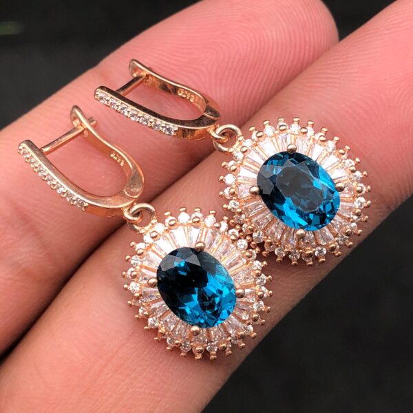 Elegant Blue Topaz Halo Earrings - Image 3