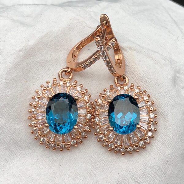 Elegant Blue Topaz Halo Earrings - Image 2