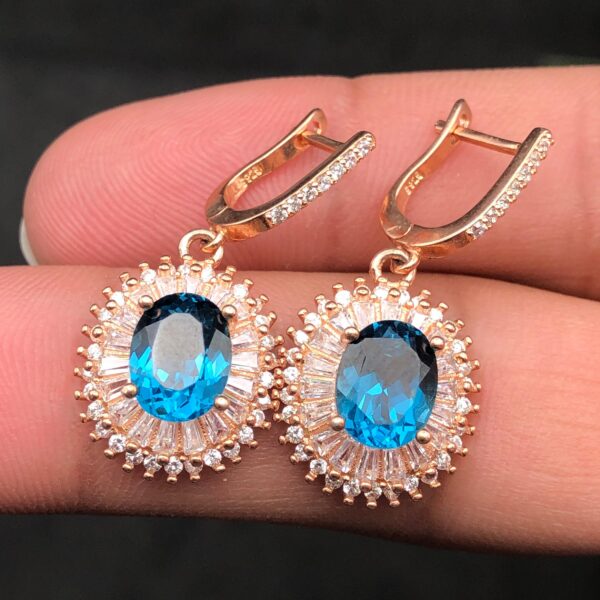 Elegant Blue Topaz Halo Earrings